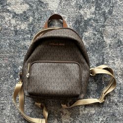 brown micheal kors mini backpack
