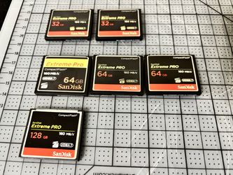 🔥 ¡MEGA COMBO Pro! Tarjetas SanDisk Extreme PRO (1 de 128GB, 3 de 64GB, 2 de 32GB) + Lector USB + 2 Estuches ¡Todo en $150! 🔥