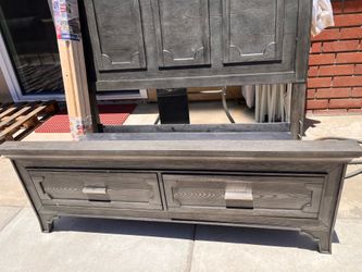Grey headboard with storage