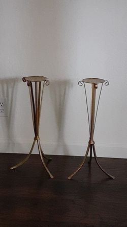 Golden candle stick holders set