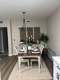 Farmhouse dining table includes buffet bar
