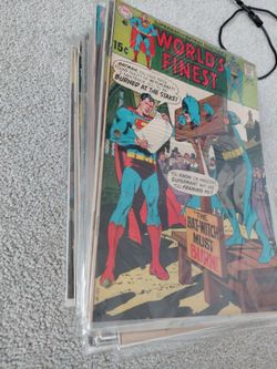 27 old comic books in sleeve's