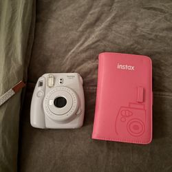 polaroid Camera And Picture Book