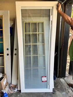 Enclosed blinds with door glass