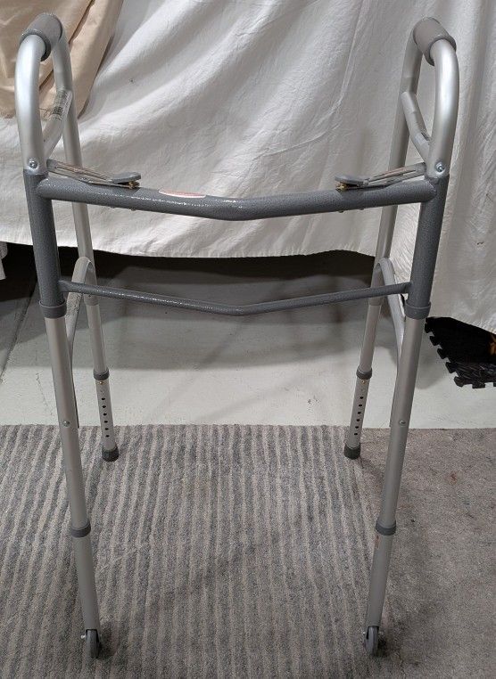Drive Medical Deluxe Two Button Folding Walker With Wheels.