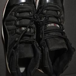 Air Jordan 11 “Bred” (Black/Red)