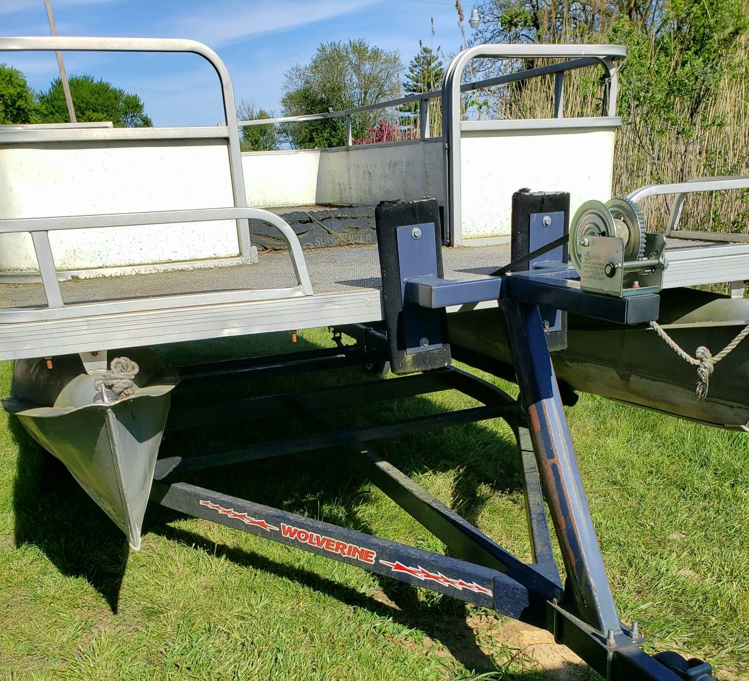 PENDING 6/4 Pontoon boat on Wolverine trailer PENDING