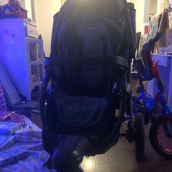 Black Chicco stroller