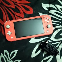 Nintendo Switch Lite – Coral Pink (Like New Condition)