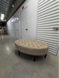 Vintage Tufted Ottoman with Wooden Legs