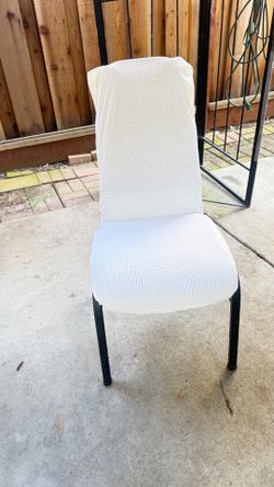 Set of 12 sturdy metal party chairs; one comes with a slipcover purchased on Temu.