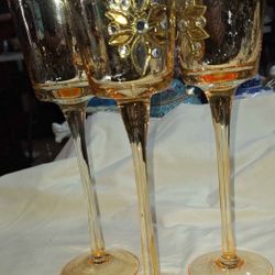 Set Of Three Tall Marigold Colored Glass Candle Holders 9 1/2 Inches Tall. Some Signs Of Wear A63H005