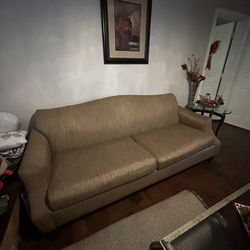 Comfortable brown sofa in good condition.  7’