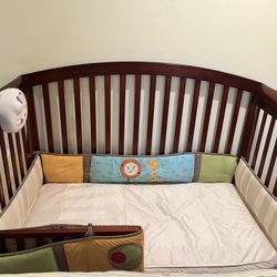 Crib with Mattress and Side Cushion