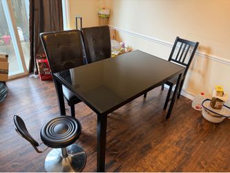 Dining table with glass top