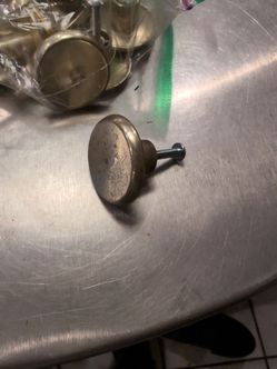Brass colored cabinet pulls - free used
