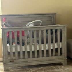grey crib 
