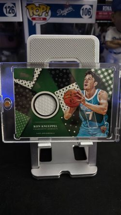 2025-26 Topps Holiday Kon Knueppel Rookie Relic Charlotte Hornets #HR-3