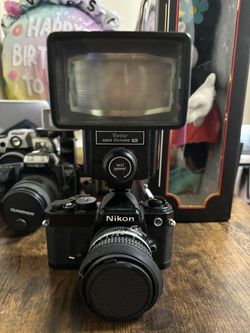 Vintage Nikon With Vivitar Zoom Thyristor
