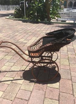 Antique stroller great condition for its age. This is a rare one