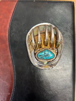 Silver belt buckle with turquoise
