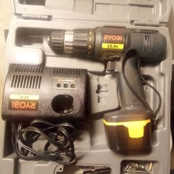 Ryobi Drill With Charger And New Battery 