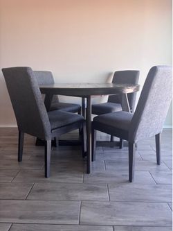 Round Dining Table + 4 Chairs — Ashley Furniture