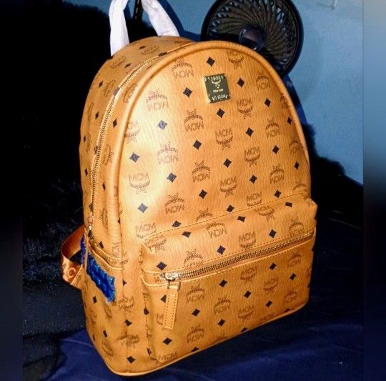 MCM Large Backpack The Color Is Cognac And This Is The Stark Studded In Visetos