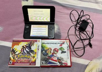 Nintendo 3DS XL Black 4GB With Pokemon Omega Ruby And Mario Kart 7 USA Model