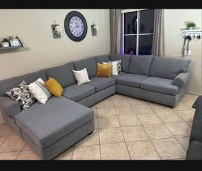 Super comfortable grey sectional couch from Living Spaces