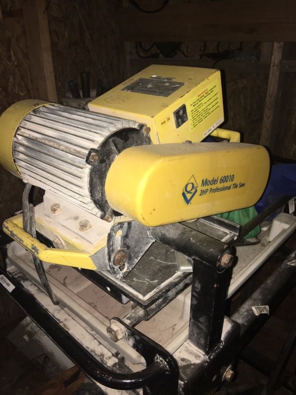 used QEP 60010 2 HP Professional Wet Tile Saw and stand