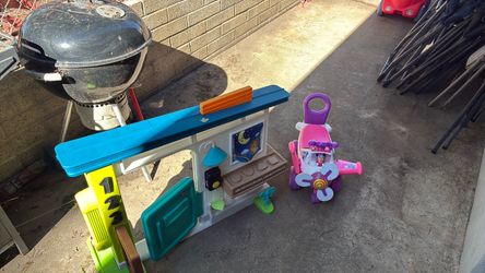 Fisher price toy and Mickey cart