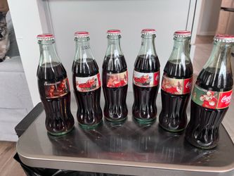 Coke bottle. 1995 Christmas 6 Pack)