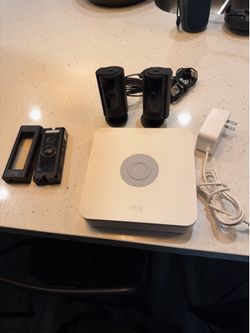Ring Pro Camera, 2 indoor cams, 1 stick up cam, and alarm base station