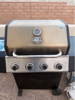 Grill and propane tanks