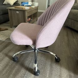 Pink swivel rolling desk chair