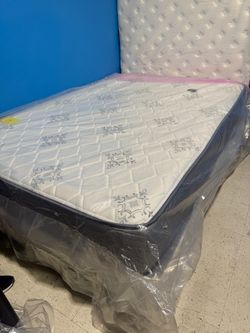 New queen mattress and box spring 2pc bed frame is not included