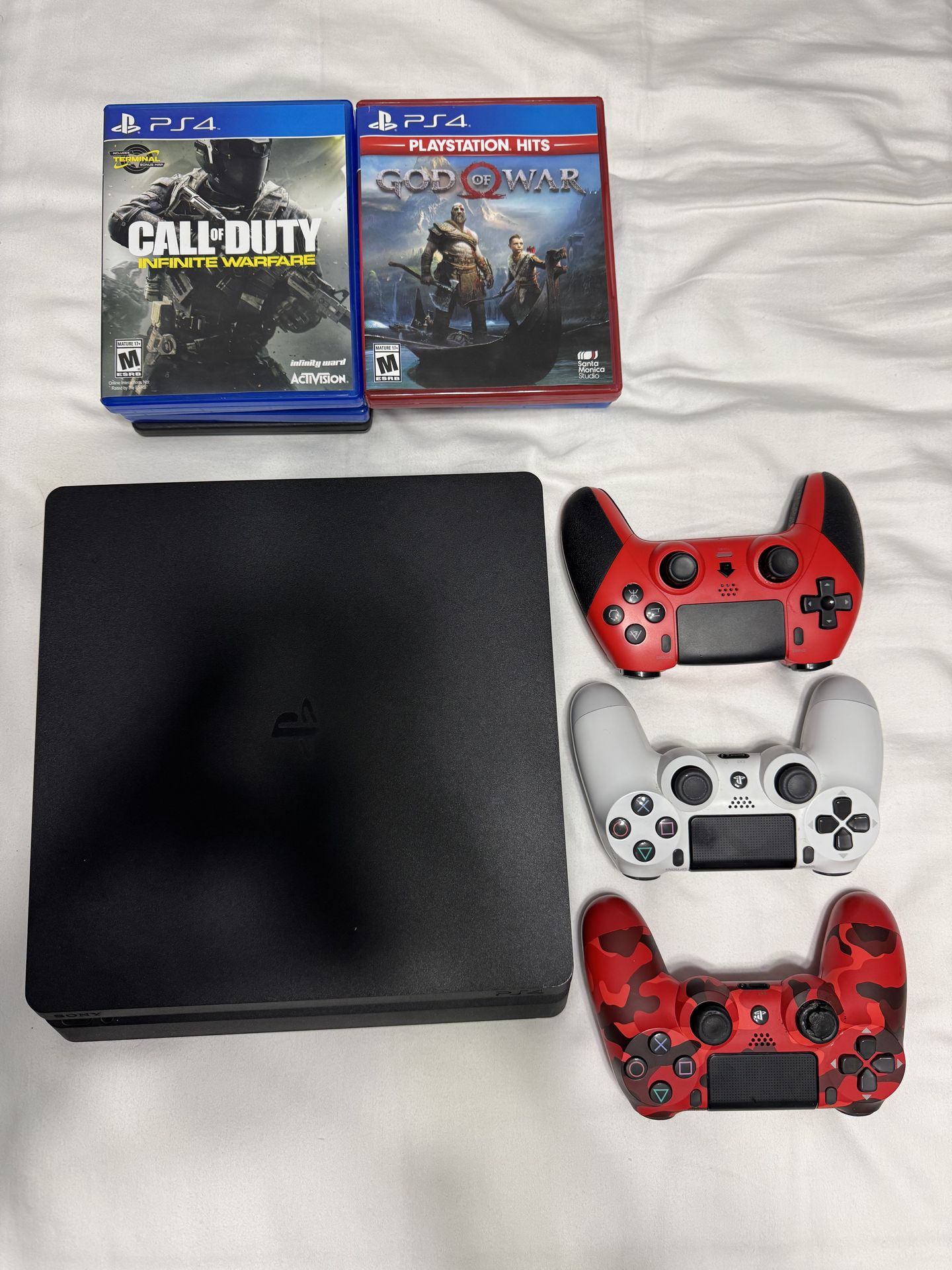 Play Station 4 slim w/games