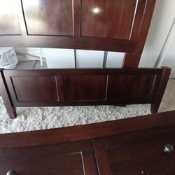 Wooden bed frame with drawers full