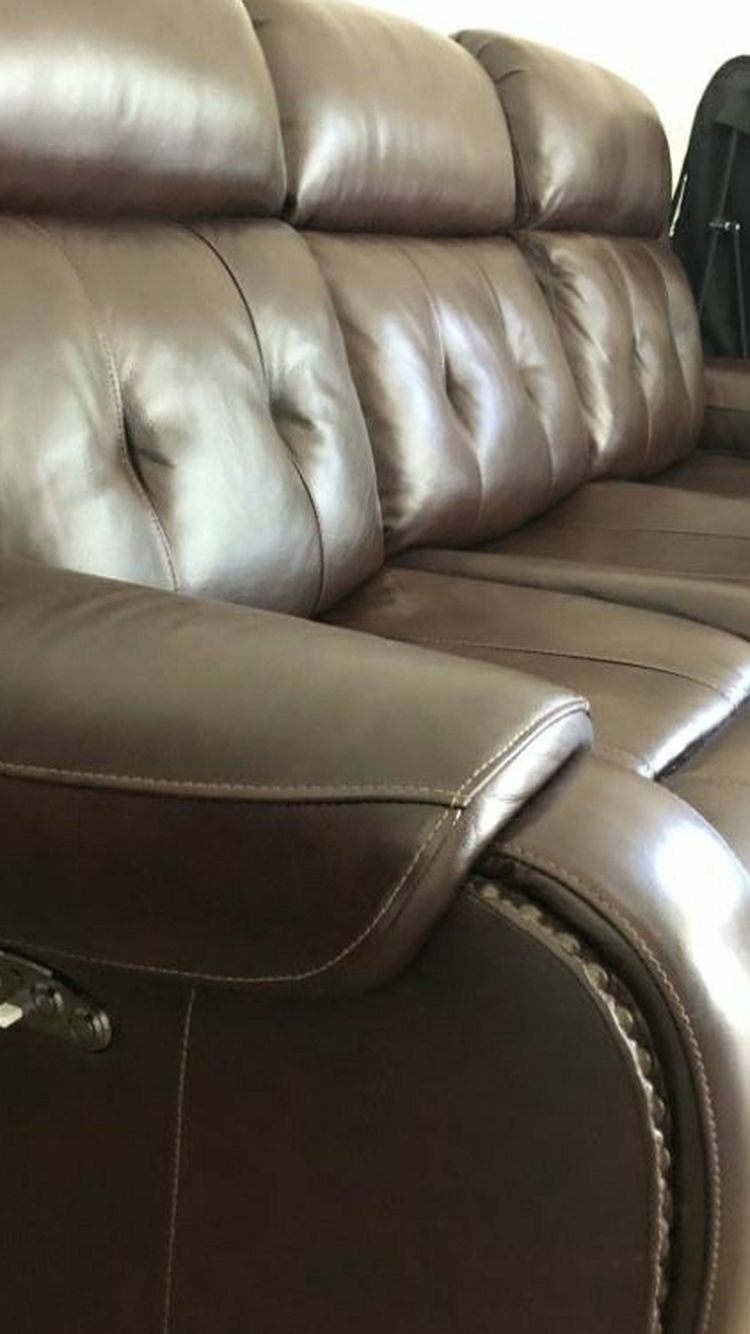Motorized Leather recliner hardly used 12 months old
