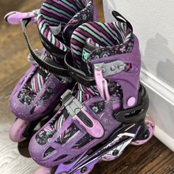 ROLLER DERBY , SIZE 12-2 AND  3-6 , PURPLE
