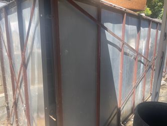Metal storage shed 4.5 ft wide by 5.9 ft high by 16 ft long
