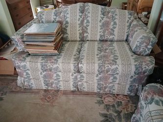 Matching floral print sofa and loveseat