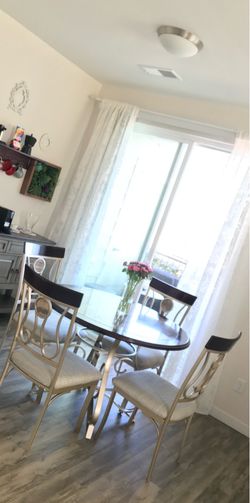 Dinning Table with four free chairs