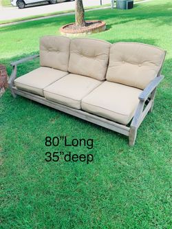 Very comfy outdoor wooden couch