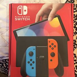 Nintendo Switch - OLED Model with Neon Red & Neon Blue Joy-Con