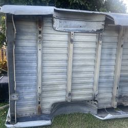 This item appears to be a used, rust-free pickup truck bed compatible with 1 Chevy Silverado or GMC Sierra https://offerup.com/redirect/?o=bW9kZWxzLkl