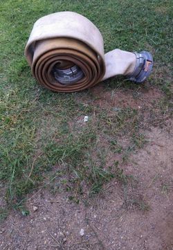 Used flat hose 25 ft along with 5in couplings on each end and 50 ft hose