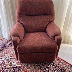 burgundy upholstered recliner chair. 