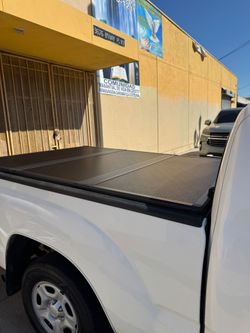 Bed covers!  Ford , GMC , Toyota etc... Different sizes